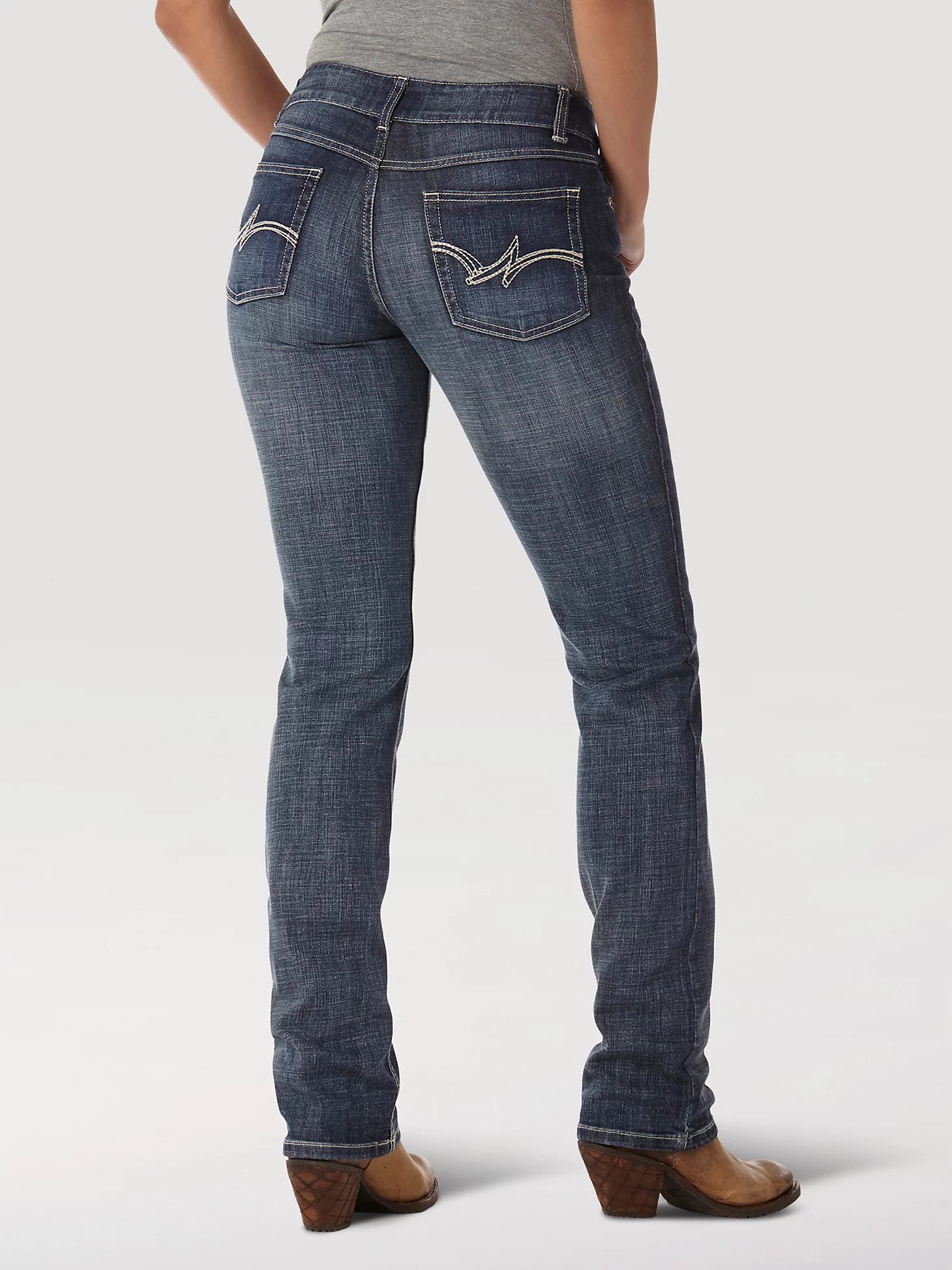 Women's Wrangler Essential Medium Wash Mid-Rise Straight Leg Jean CLOSEOUT. Back View showing back pocket detail.