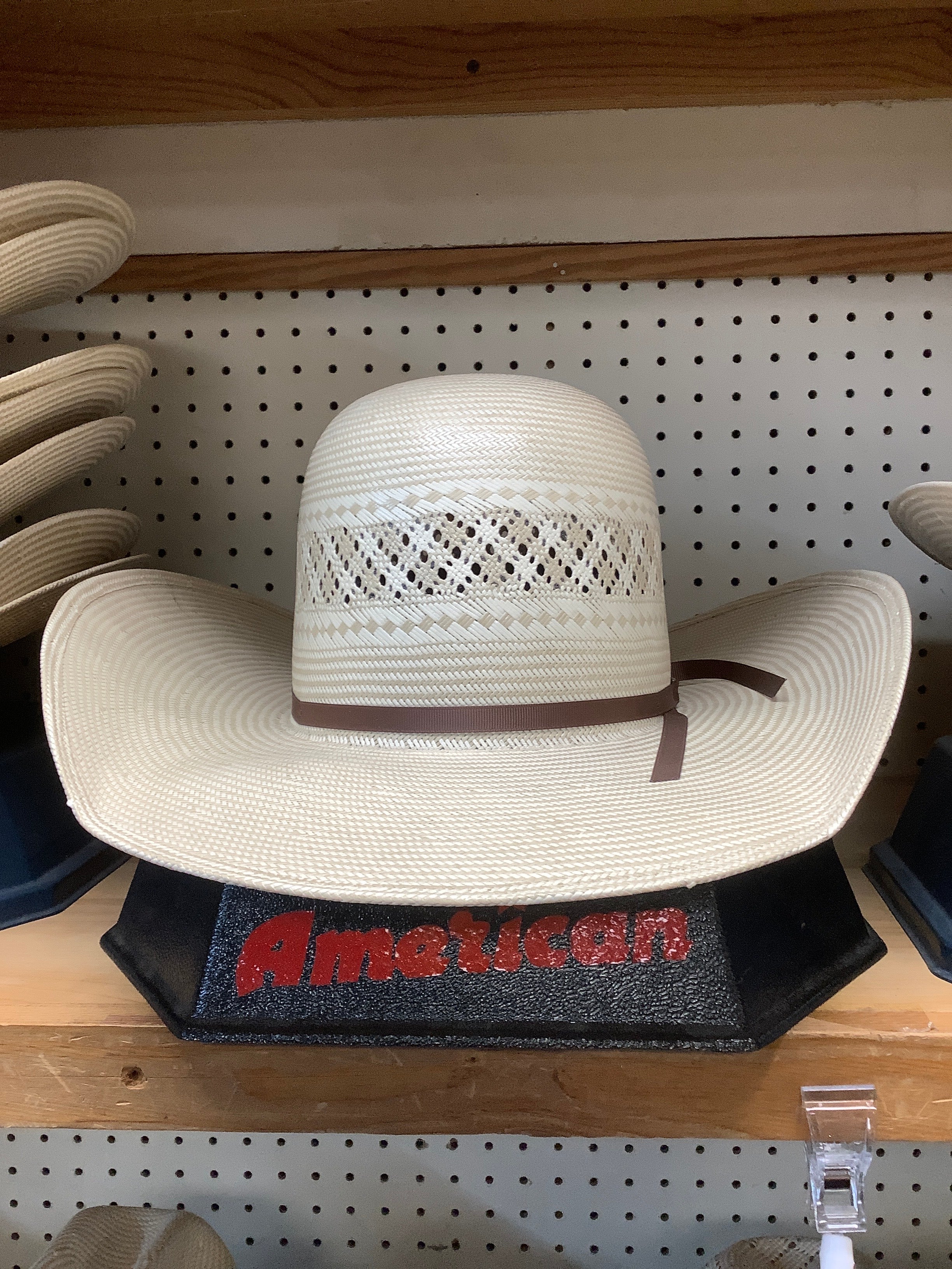 American straw hat with a Cool Hand Luke brim and a open crown.