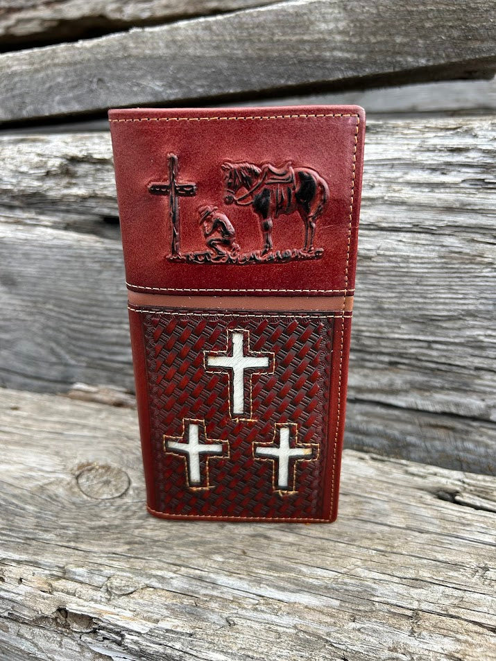 Brown leather tall wallet with embossed Praying Cowboy design on top of a basketweave leather bottom with three cowhide inlay crosses. Front View A