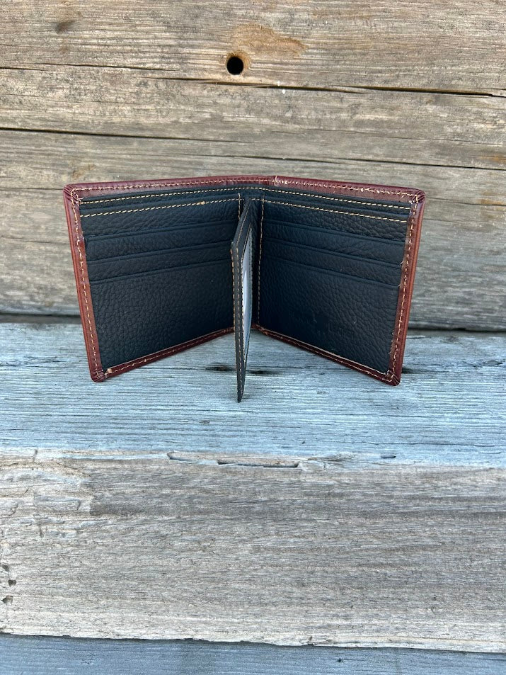 Embossed Praying Cowboy design brown leather bifold wallet. Inside view showing six card slots, and a dual ID window.