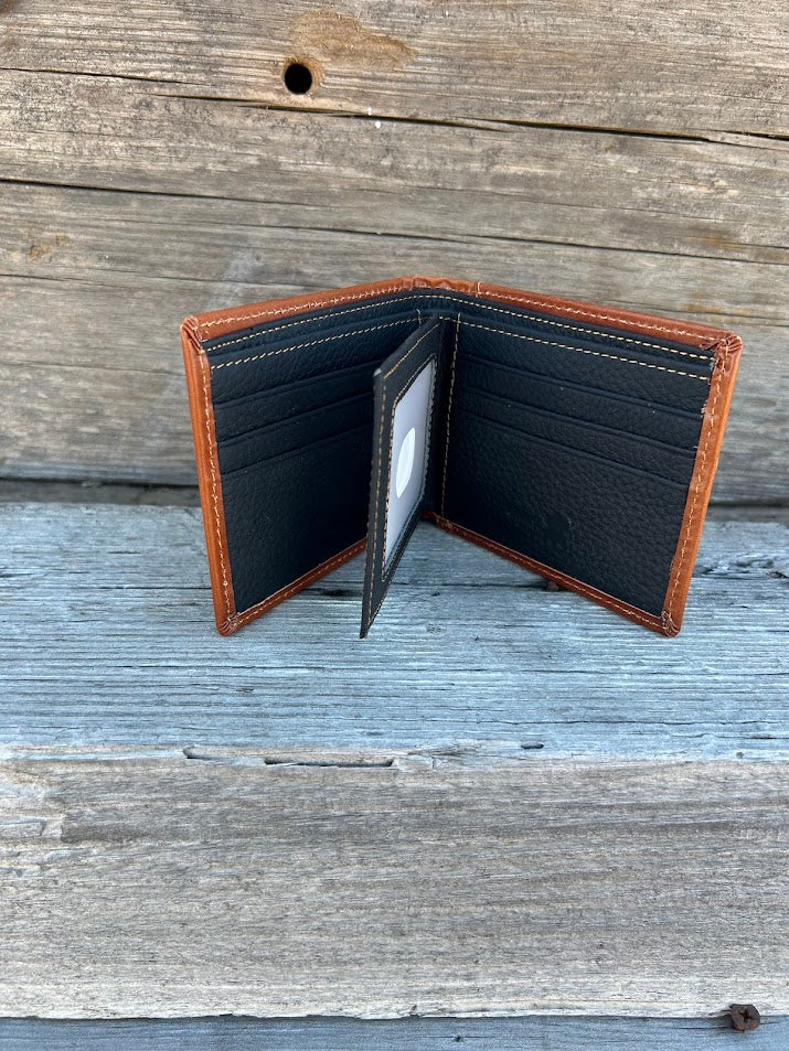 Light brown leather bifold wallet featuring a embossed Praying Cowboy design on the front. Inside view showing multiple card slots and a dual ID window.