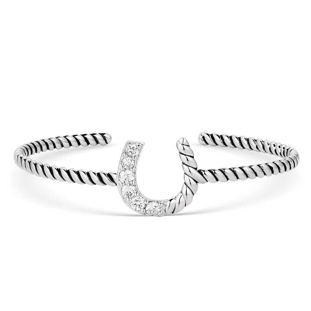 Silver horseshoe cuff bracelet with a twisted rope design around cuff and half of the horseshoe, the other half of the horseshoe has cubic zirconia crystals.