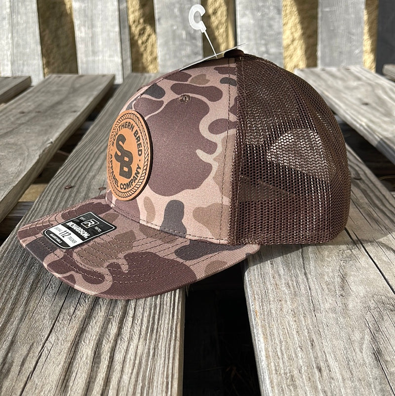 Southern Bred Caramel Leather Patch Richardson 112 Adjustable Snap Back Cap In Bark Duck