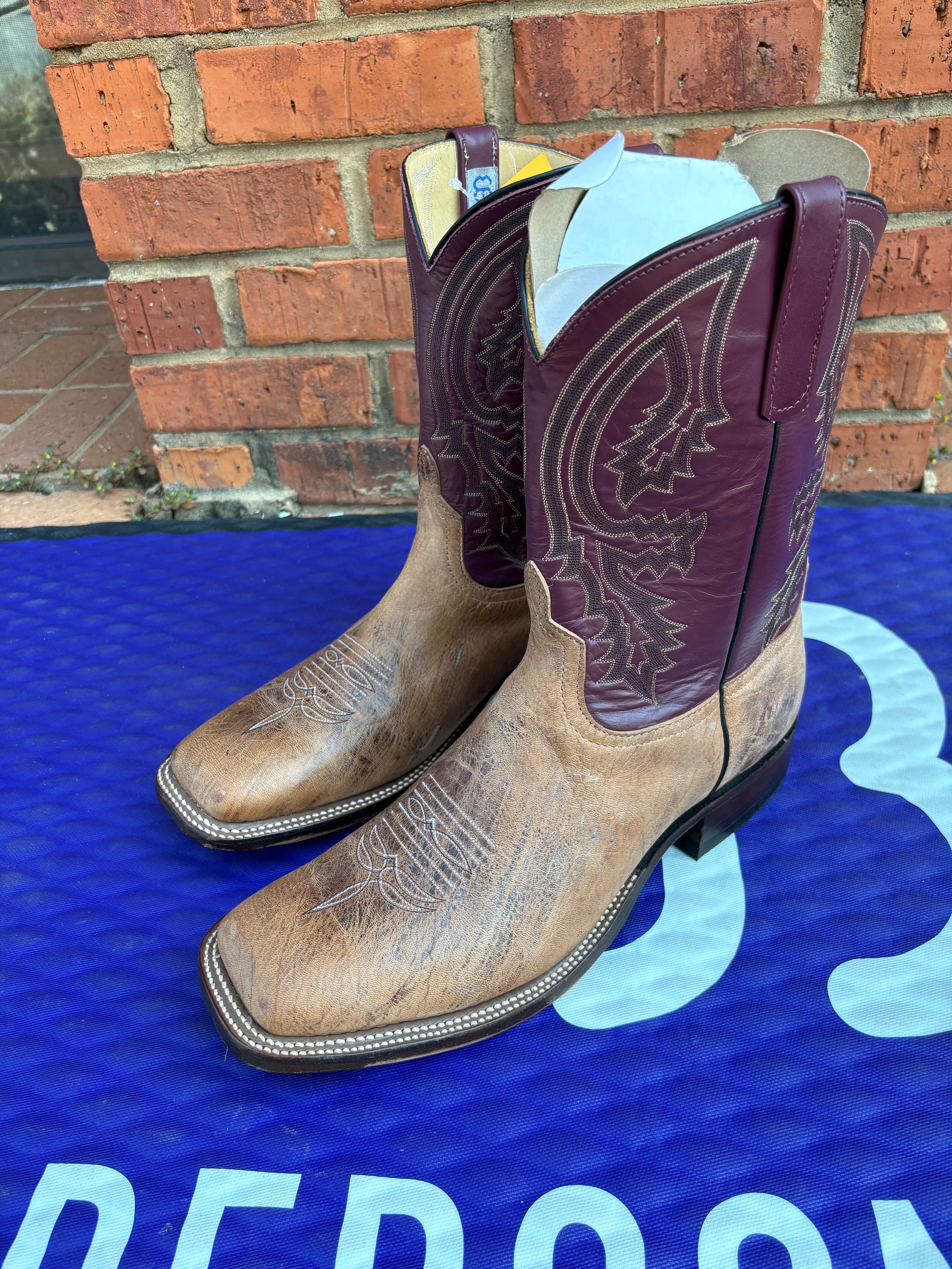 Men's Anderson Bean square toe Mad Cat Goat boots with a Glove Burgundy shaft. Side view showing the intricate stitch pattern on the 10 inch shaft.