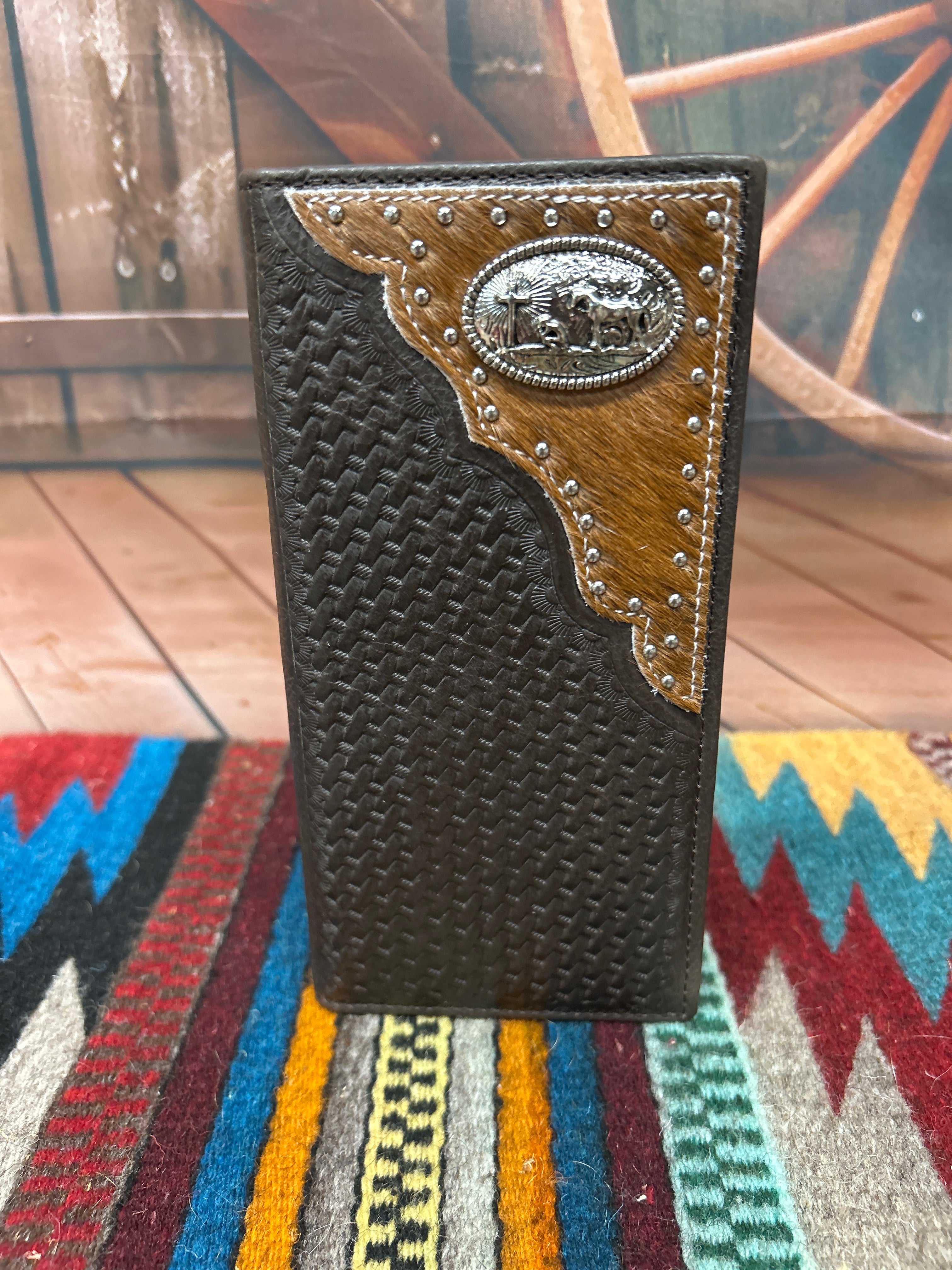 This Coffee Brown basketweave leather wallet features a Praying Cowboy Concho on a Hair- On corner. Front View