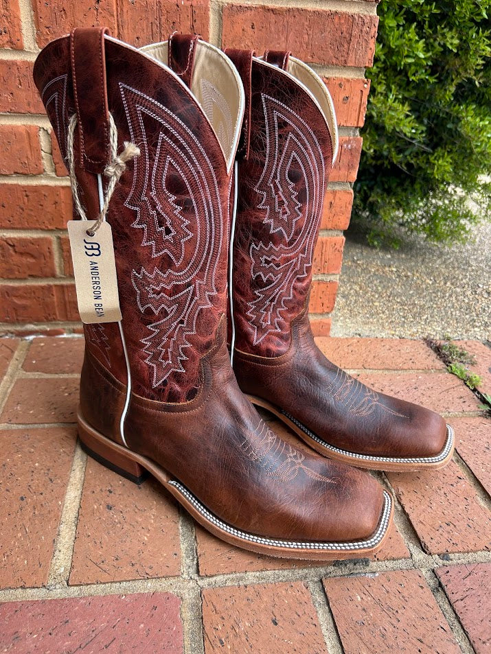 Men's Anderson Bean Mike Tyson Bison cowboy boots. These boots feature a square toe and a rust lava 13" shaft. They have a walking heel and a hybrid outsole.