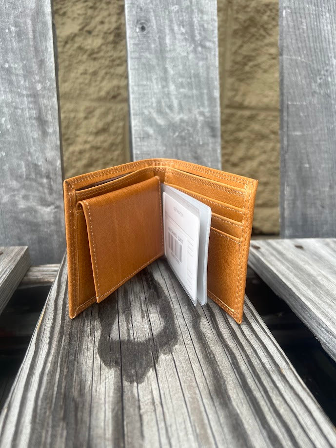 Zep-Pro Mississippi State Tan Leather Bi-fold Wallet inside view showing:
3 interior credit card slots
2 interior pockets
1 pullout ID case
2 bill/cash compartments