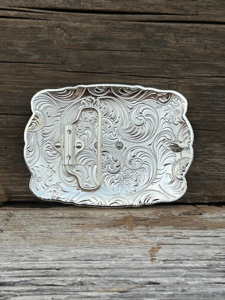 This matte black buckle features a Silver Longhorn design with a intricate Silver border. Rear View