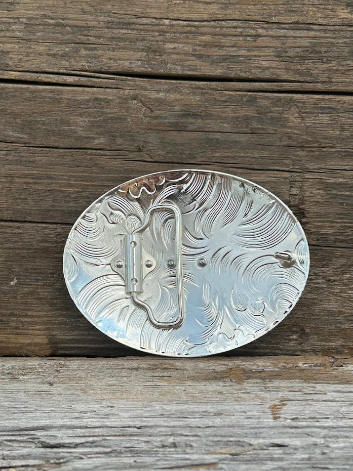 Intricate designed Silver oval belt buckle with a Gold horse running in the middle. Rear View