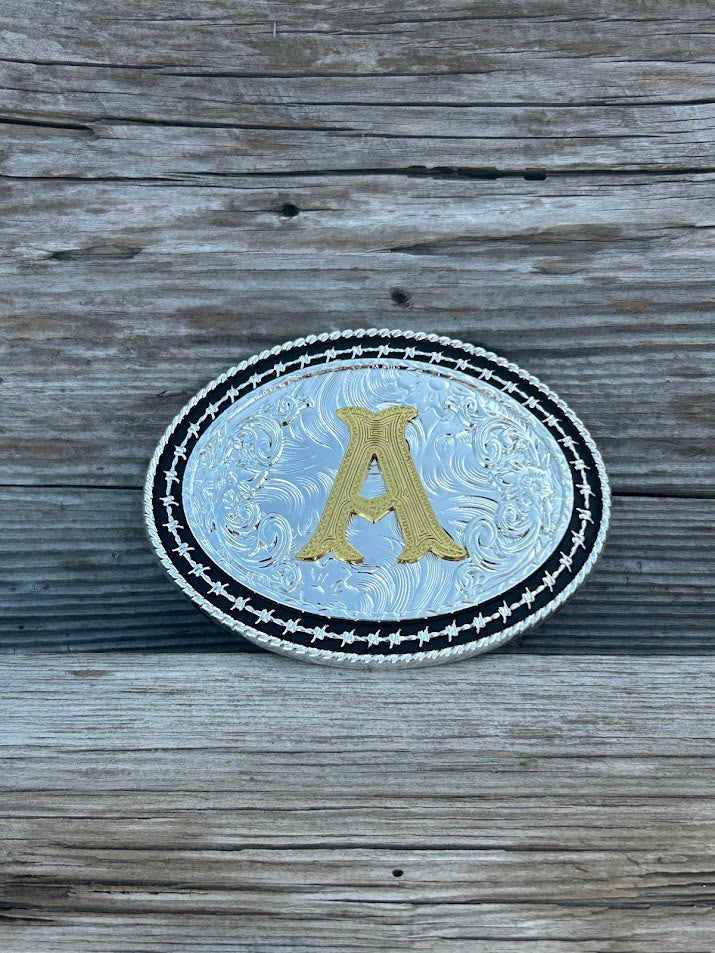 Matte Black and Silver oval shaped belt buckle with Gold initial. Initial A