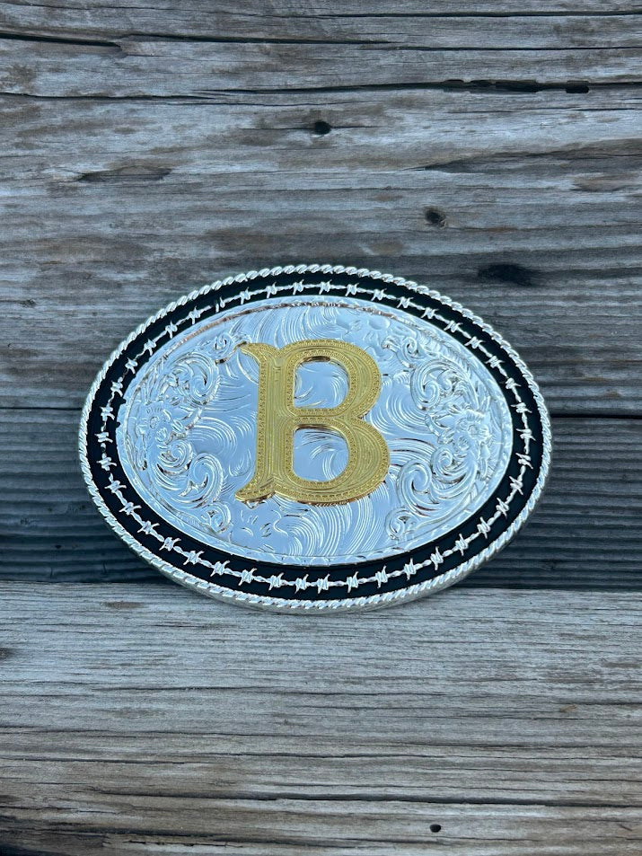 Matte Black and Silver oval shaped belt buckle with Gold initial. Initial B