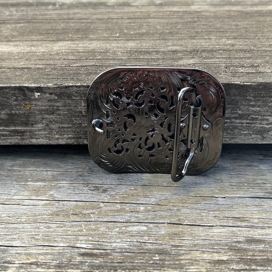 This matte black buckle features a floral scrollwork pattern with rhinestone accents and a rhinestone border. Rear View
