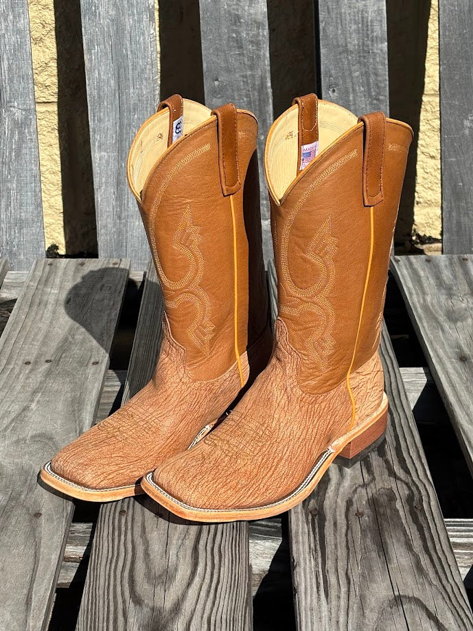 Men's Anderson Bean square toe cowboy boots in Peanut Poseidon goat with tan goat 12" shafts. Side view showing contrast piping.