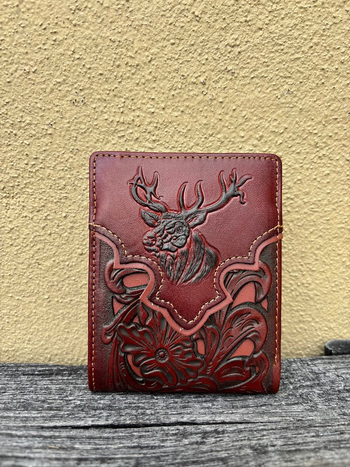 A brown bifold wallet featuring a embossed buck design with brown inlay. Front View
