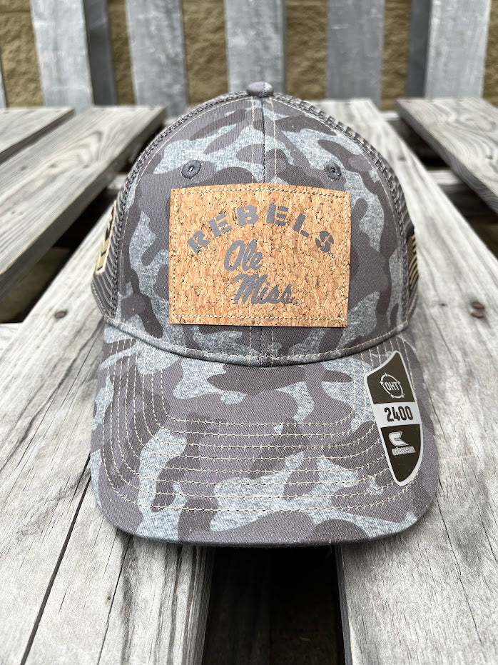 Colosseum Athletics Heather Camo snapback cap with a University of Mississippi "Ole Miss" Rebels logo cork patch on the front. Front View
