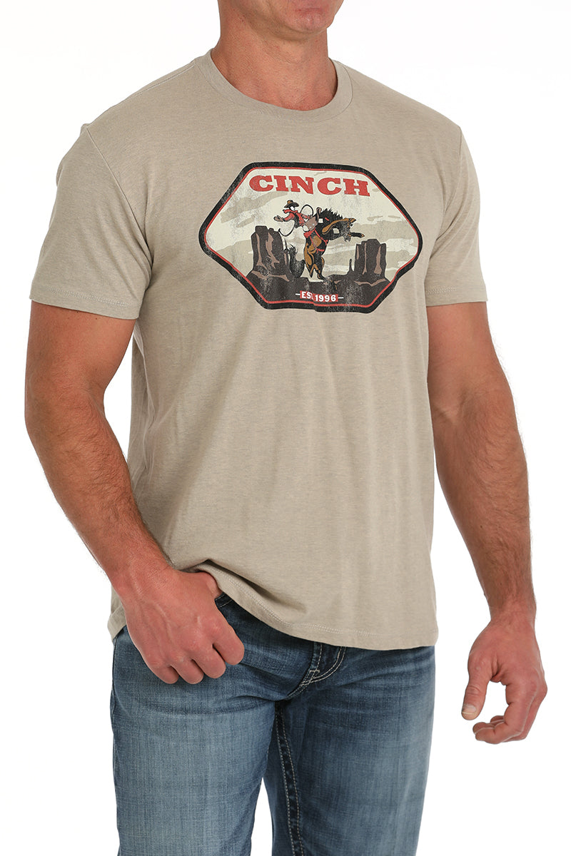 Men's Cinch khaki vintage chest logo crew neck tee shirt with short sleeves. Front view.