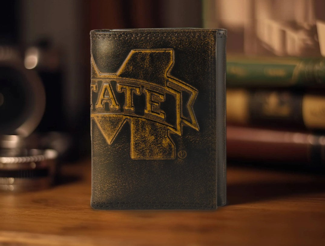 Zep Pro Mississippi State University Bulldogs Burnished Antique Brown Leather Tri-fold Wallet. Front view shows "M State" logo across spine of wallet.