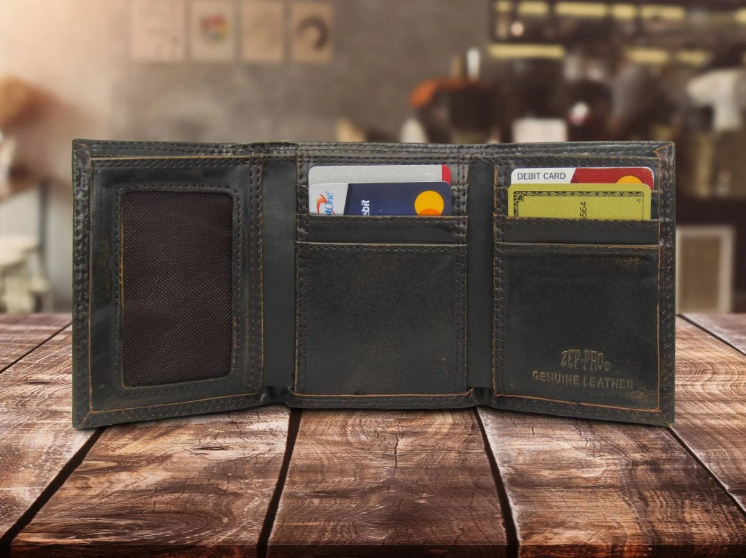 Zep Pro University of Mississippi Burnished Antique Brown Leather Tri-fold Wallet Inside view showing:
Dark brown crazy horse leather
6 interior credit card slots
2 interior pockets
1 ID window
2 bill/cash compartments