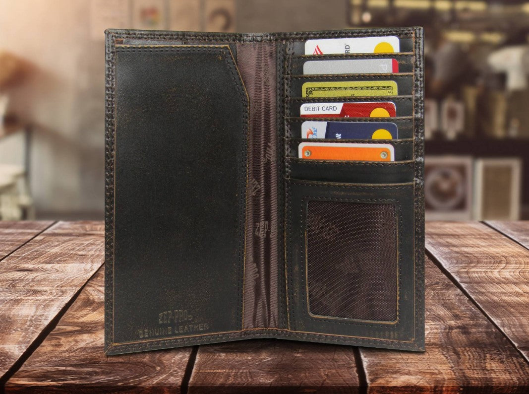 Zep Pro University of Mississippi Burnished Antique Brown Leather Tall wallet. Inside view shows:
Dark brown smooth leather
6 interior credit card slots
1 ID window
2 bill/cash compartments