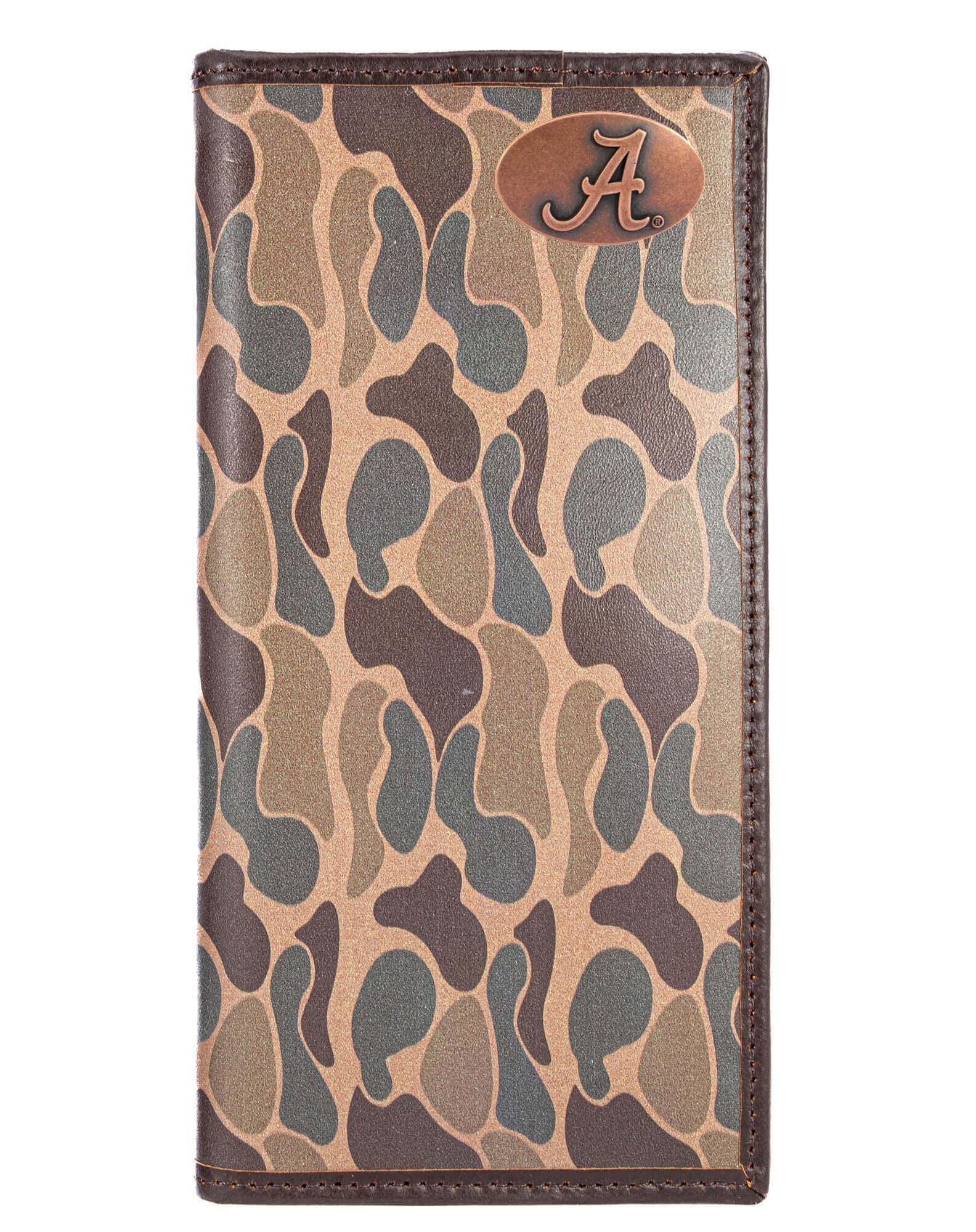 Old School Camo print and features the school’s official logo, proudly displayed on the front upper right corner. The metal concho emblem has an antique copper finish which perfectly accents this unique wallet. Front view.