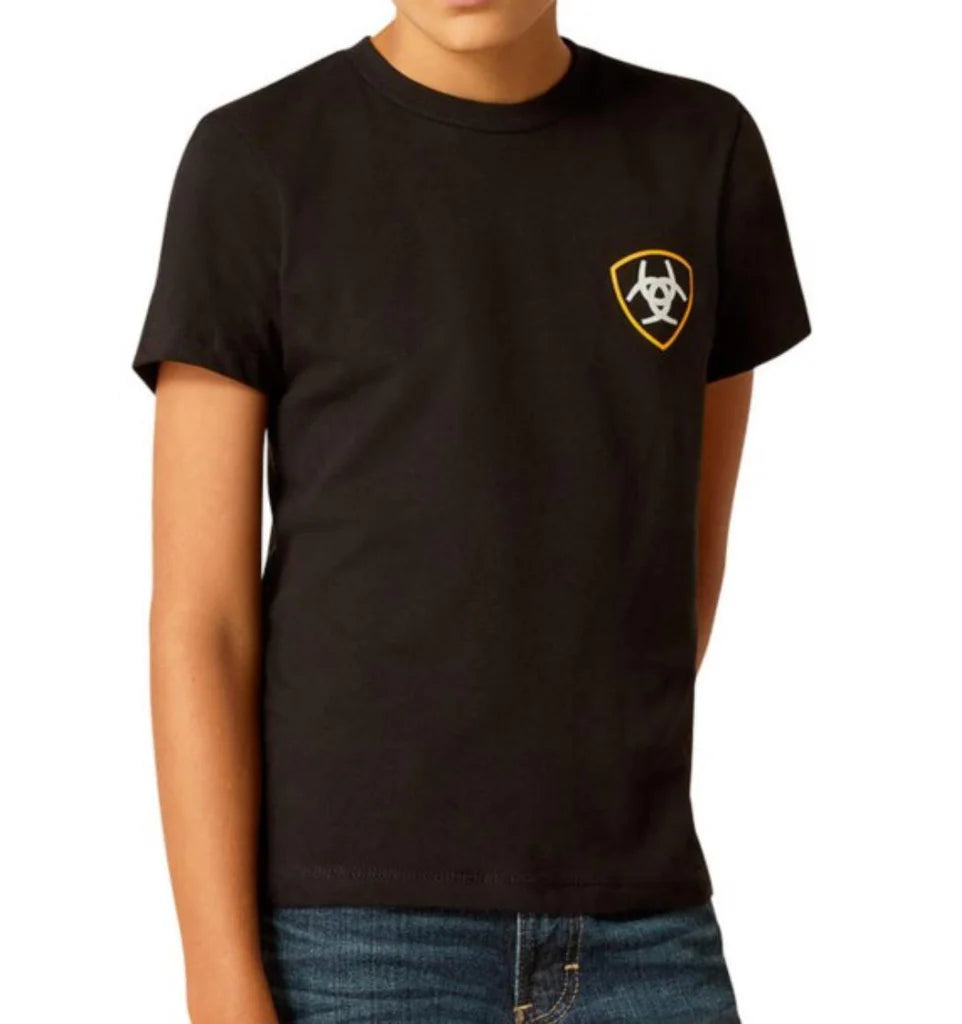 Boy's Ariat short sleeve black graphic print T-Shirt. Front view showing shirt untucked and Ariat shield logo graphic on left chest.