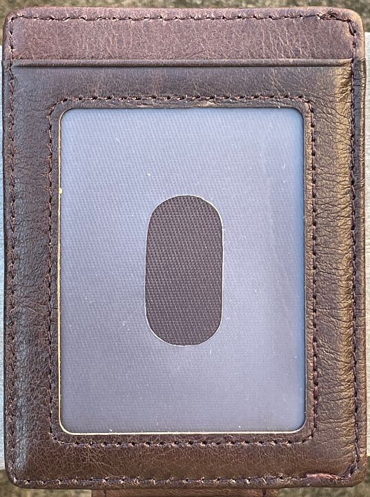 This brown full grain leather money clip from Top Notch Accessories features an ID slot and multiple card slots. ID window view.