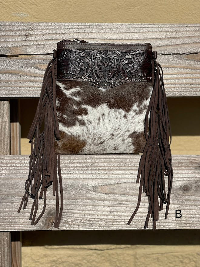 This Coffee Brown tooled leather and cowhide bag has side fringe. Front View B
