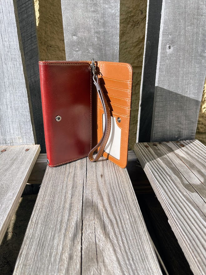 Brown tooled leather phone case wallet with Beige inlay. Inside view showing ID window and multiple card slots.
