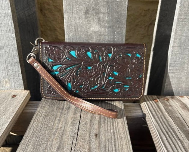 Coffee Brown leather phone case wallet with turquoise inlay and a wristlet strap. Front View