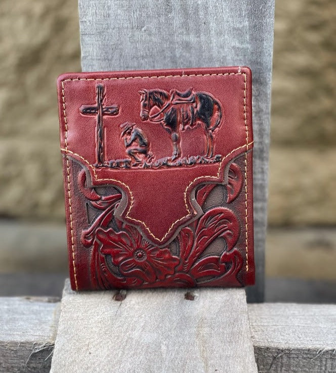 Brown bifold wallet with a Brown inlay and a embossed Praying Cowboy design. Front View