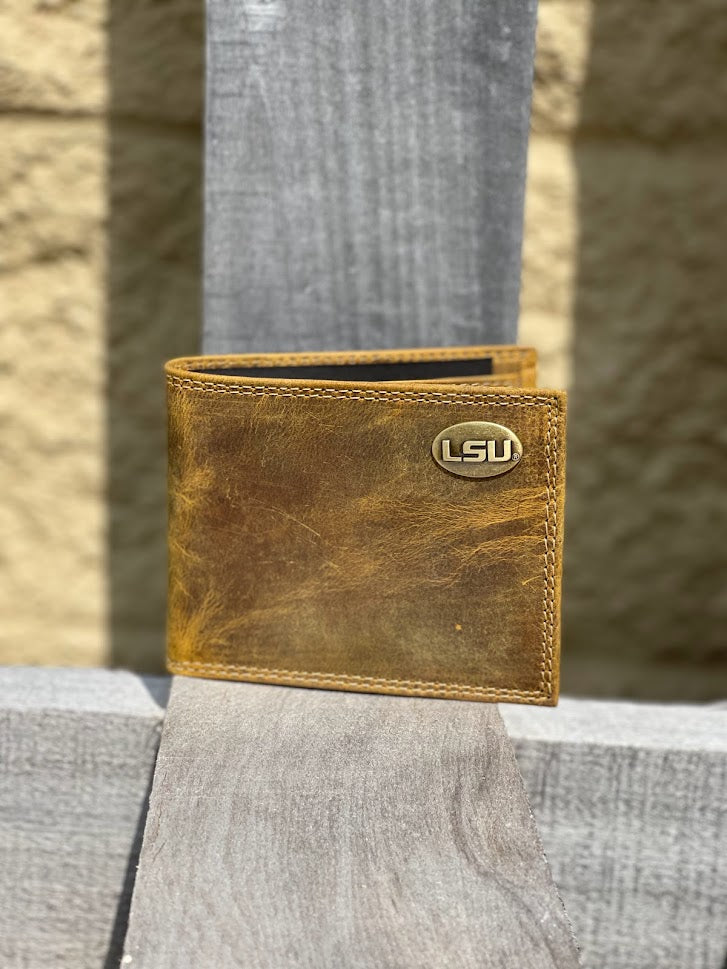 Zep Pro Louisiana State University Tigers Vintage Tan Leather Bi-fold Wallet. Front view show brass LSU logo concho on top right corner.