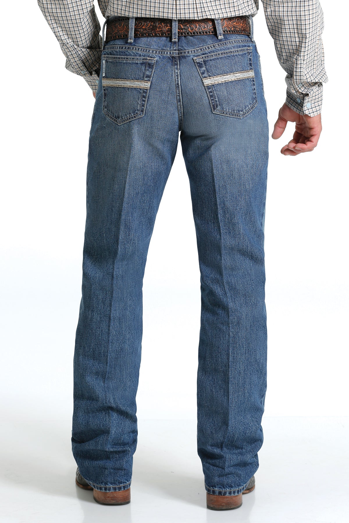 Men's White Label Light Wash jeans back view showing detail of back pockets, belt loop placement, relaxed fit on seat and leg, stack on boots.
