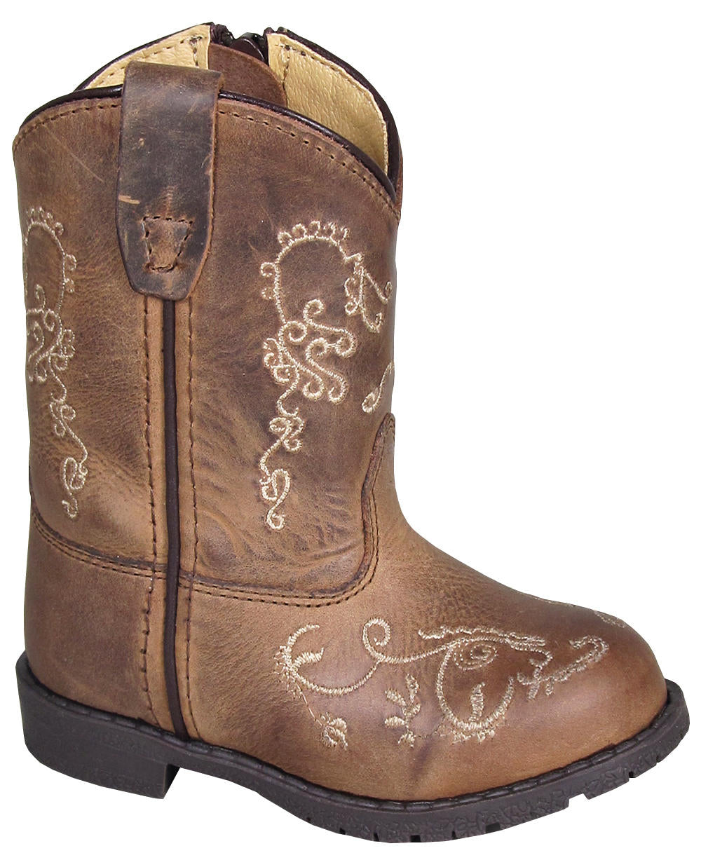 Toddler's brown leather boot with an all-over floral design and a zipper on the side. Side view.