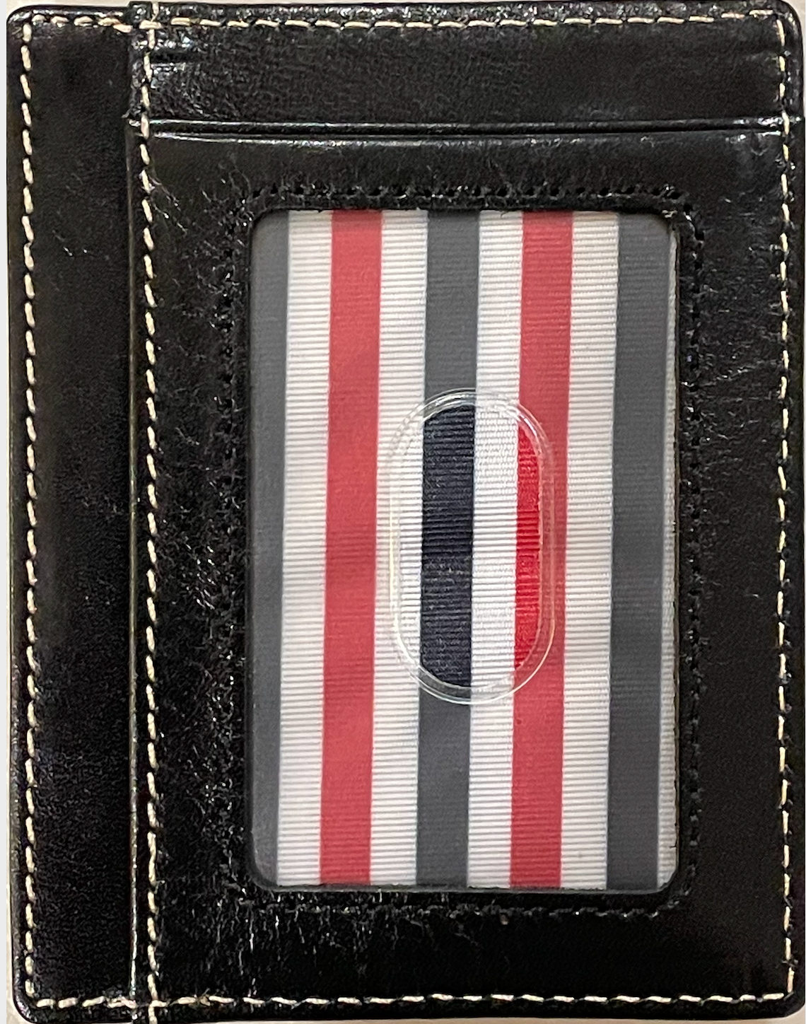 A black full grain leather front pocket wallet with visible stitching and the brand name 'Albrint' embossed on the bottom right.