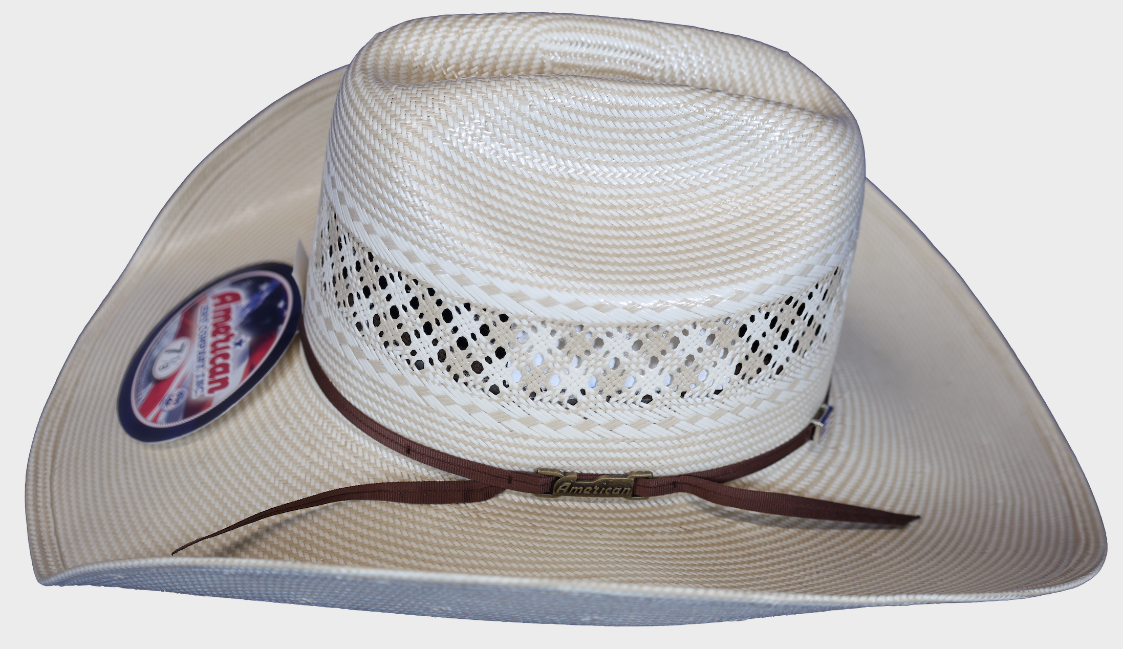 American Hat Company straw hat with rancher crease shape. Side view featuring hat band and logo.