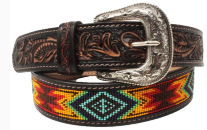 A full-grain leather belt with antique tooled leather design and beaded details, featuring a Western buckle. Close up front view of buckle and bead details.