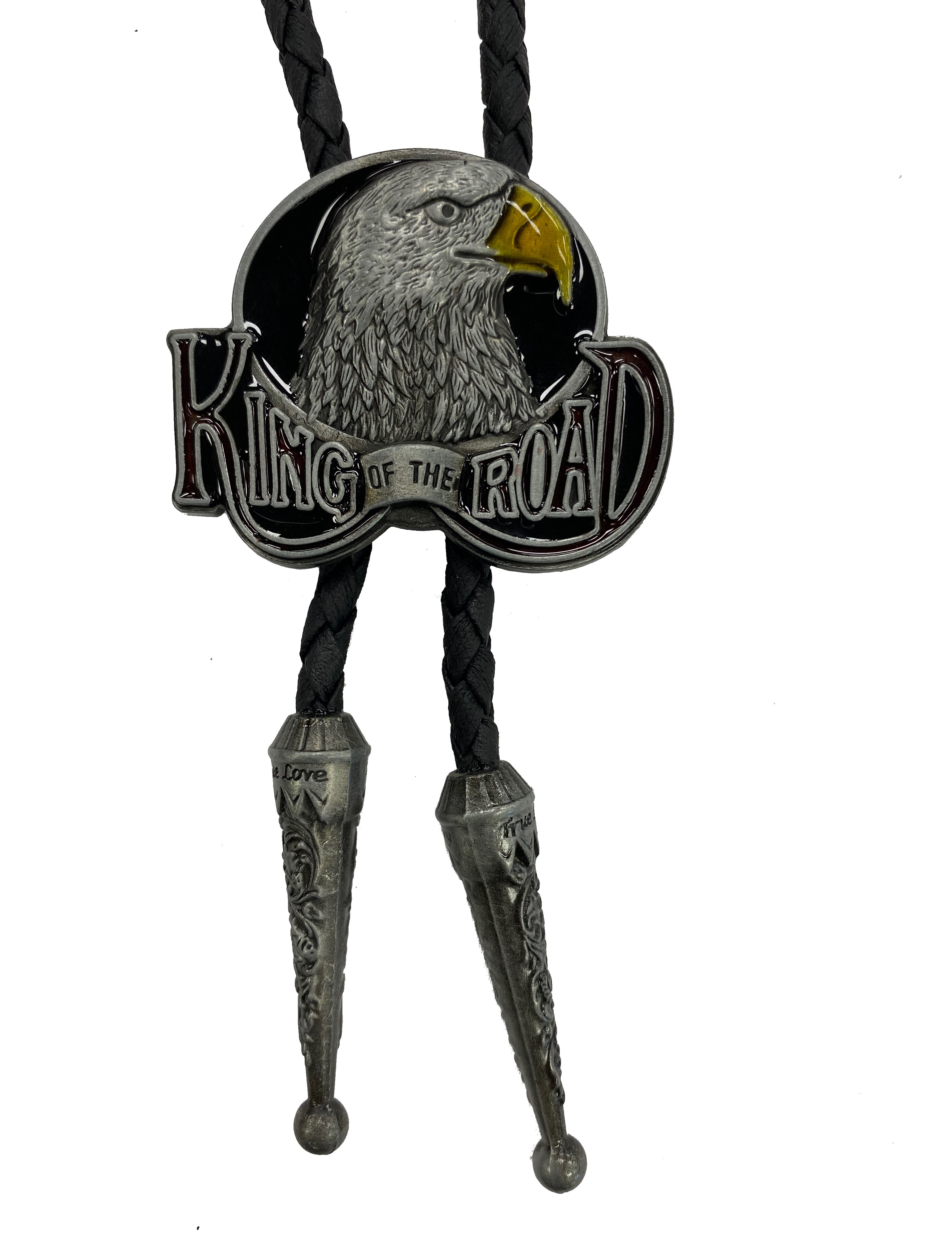 This bolo tie features a Eagle with King of the Road lettering. Designed to be one-size-fits-most, this bolo tie provides versatility and ease, ensuring it complements every outfit seamlessly.
