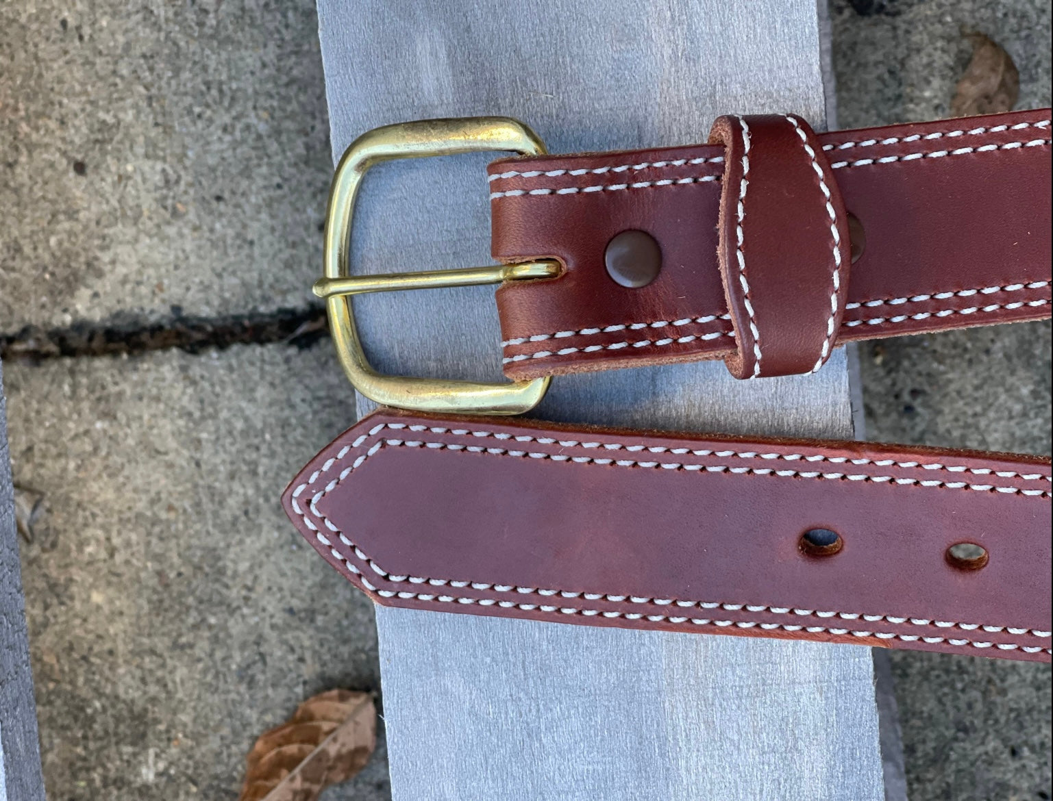 Brass buckle end and holes tip end shown.