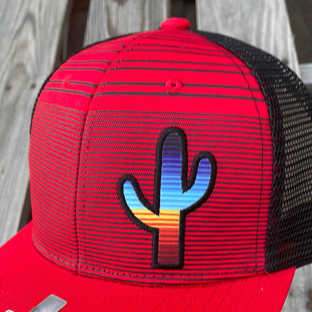 Red and Black striped trucker cap with a cactus patch design on the front, it has a solid Red bill and a Black mesh back. Close up view of cactus patch.