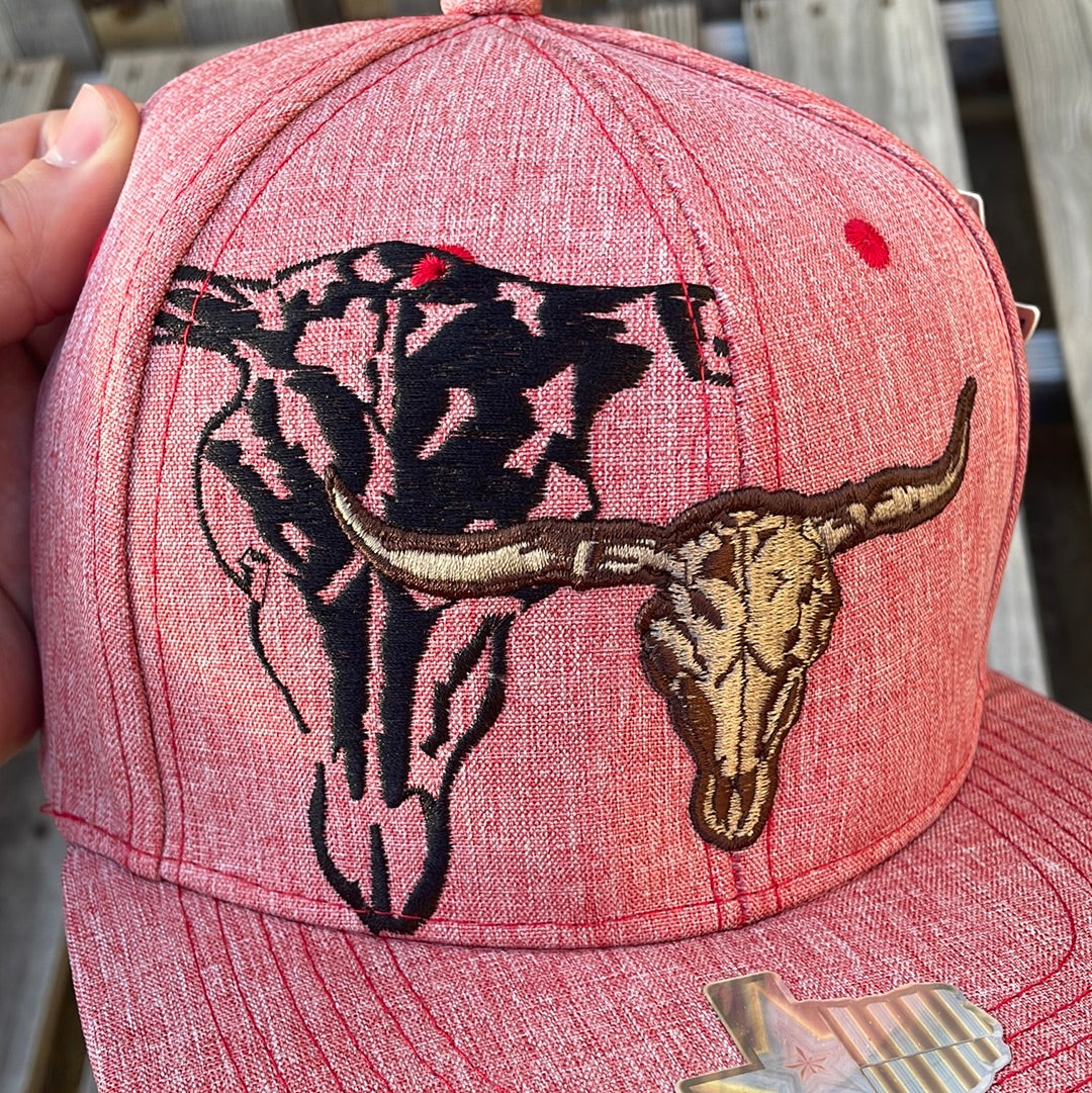 Heather Red snapback cap with a graphic of two longhorn steers on the front and a small longhorn on the rear. Close up view of front longhorns design.
