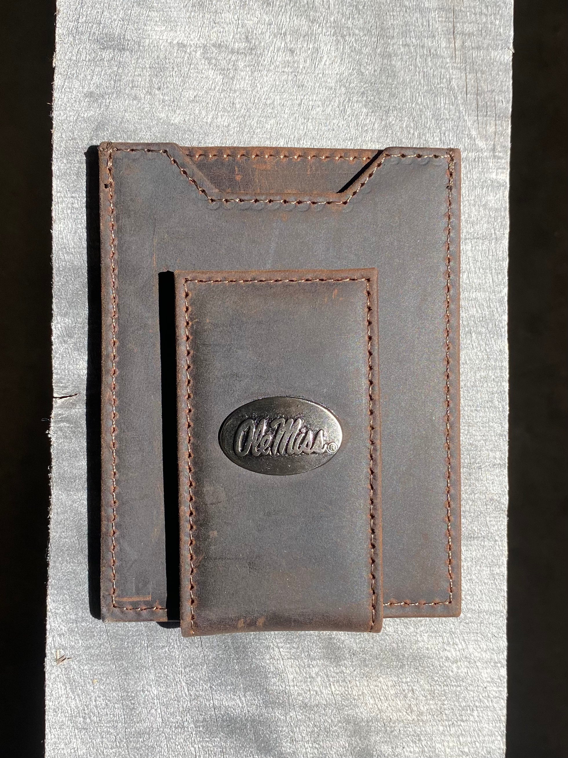 Zep Pro Ole Miss Brown “Crazy Horse” Leather Front Pocket Wallet with brass Ole Miss logo oval concho on bill closure tab. Front view.