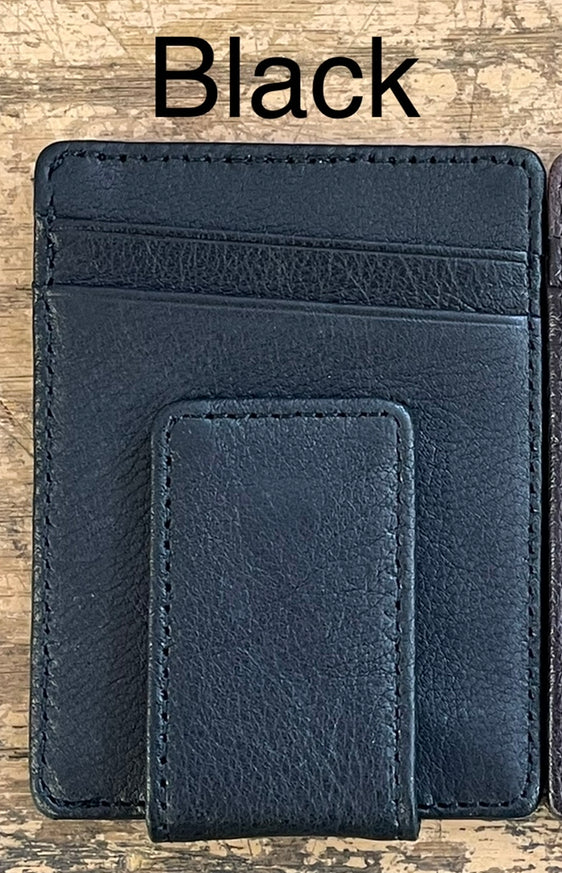 A black full grain leather money clip with seven total card slots.