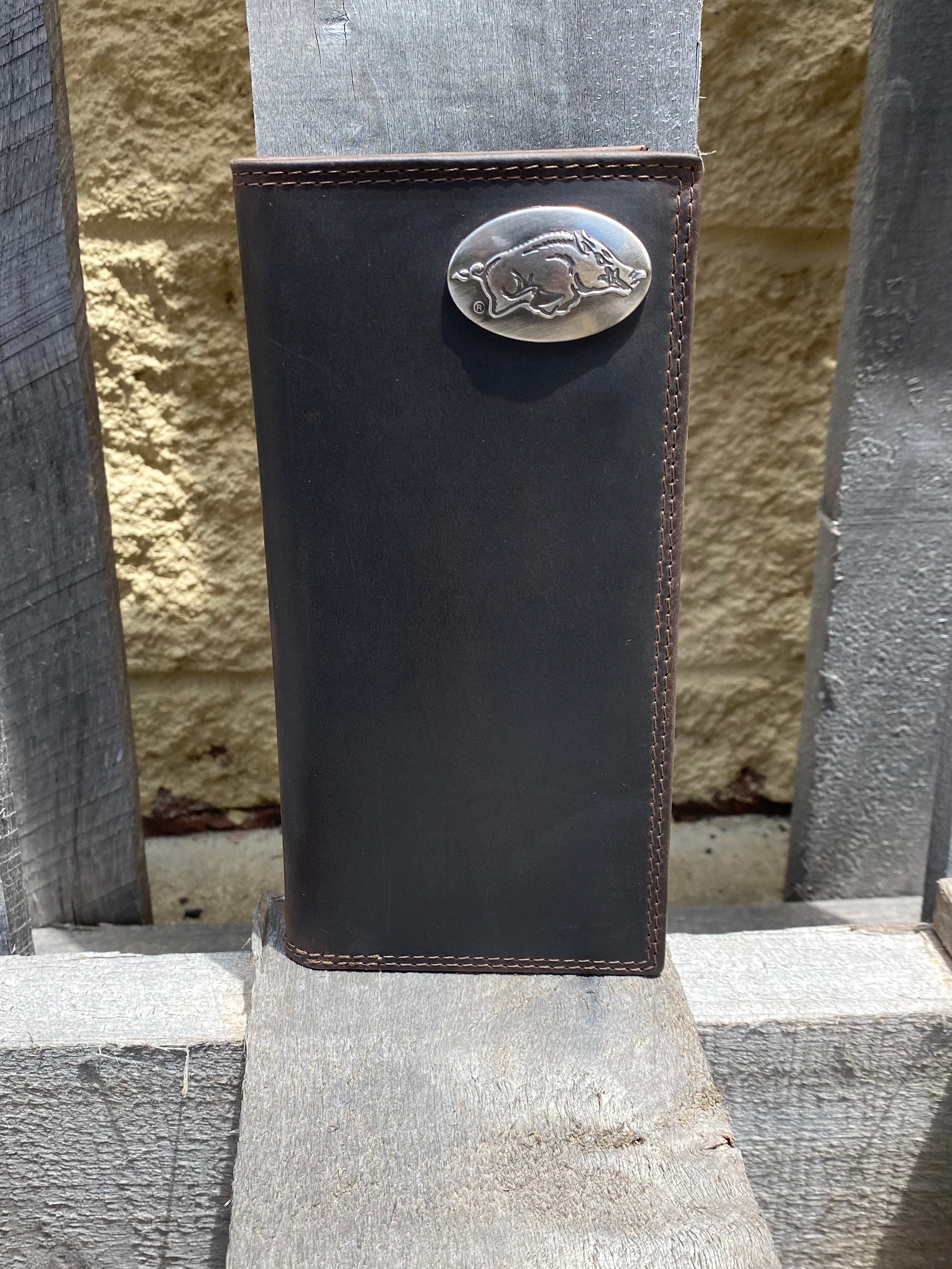 Zep-Pro University of Arkansas Razorbacks Brown “Crazy Horse” Leather Tall Wallet with oval metal Razorback logo concho in upper right corner. Front view
