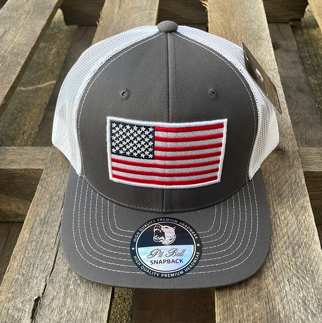 Charcoal and white mesh back Pit Bull Snapback cap with an embroidered American flag patch on the front. Front View