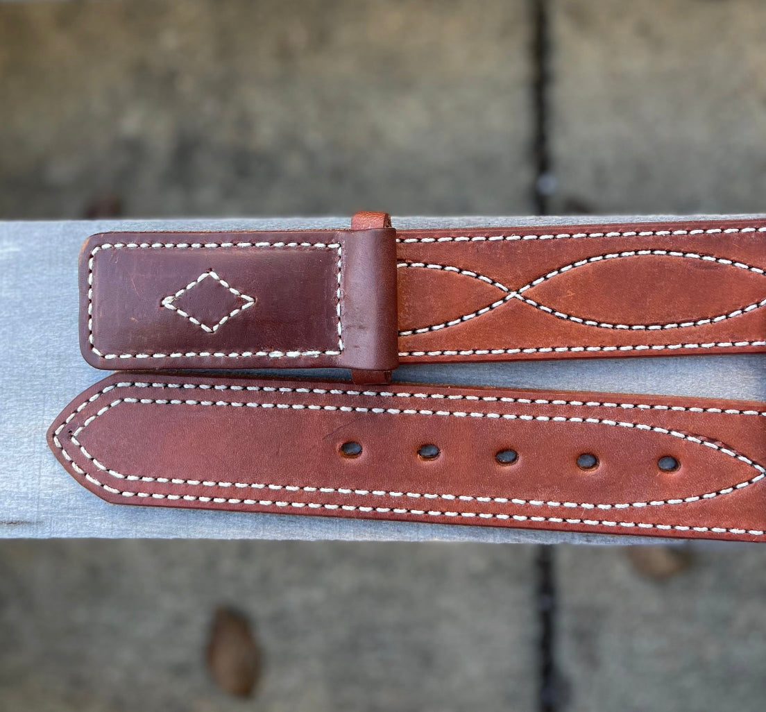 Buckle end and hole-punched end shown.