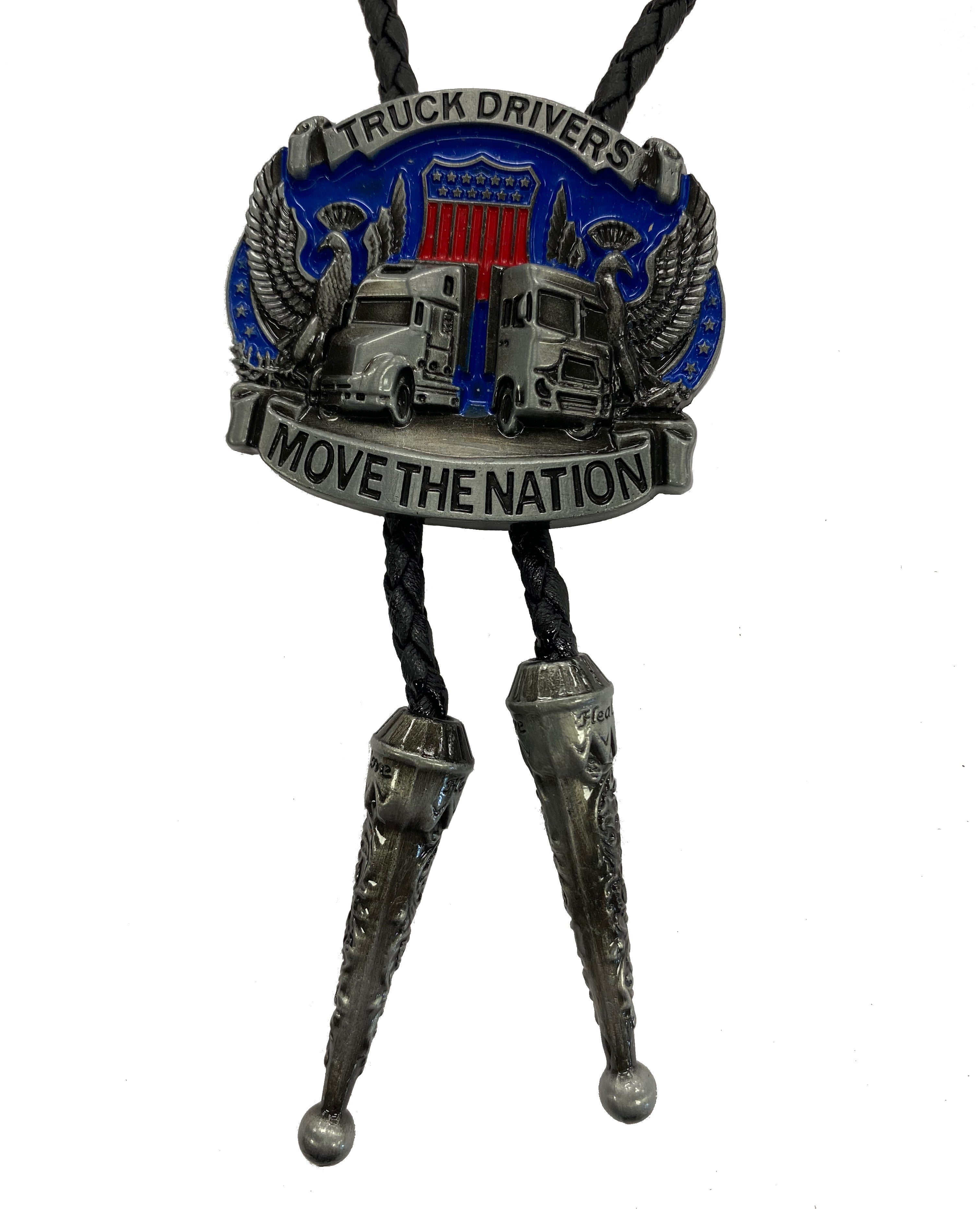 This bolo tie shows two semi trucks with a script around the top and bottom stating "Truck Drivers Move The Nation".