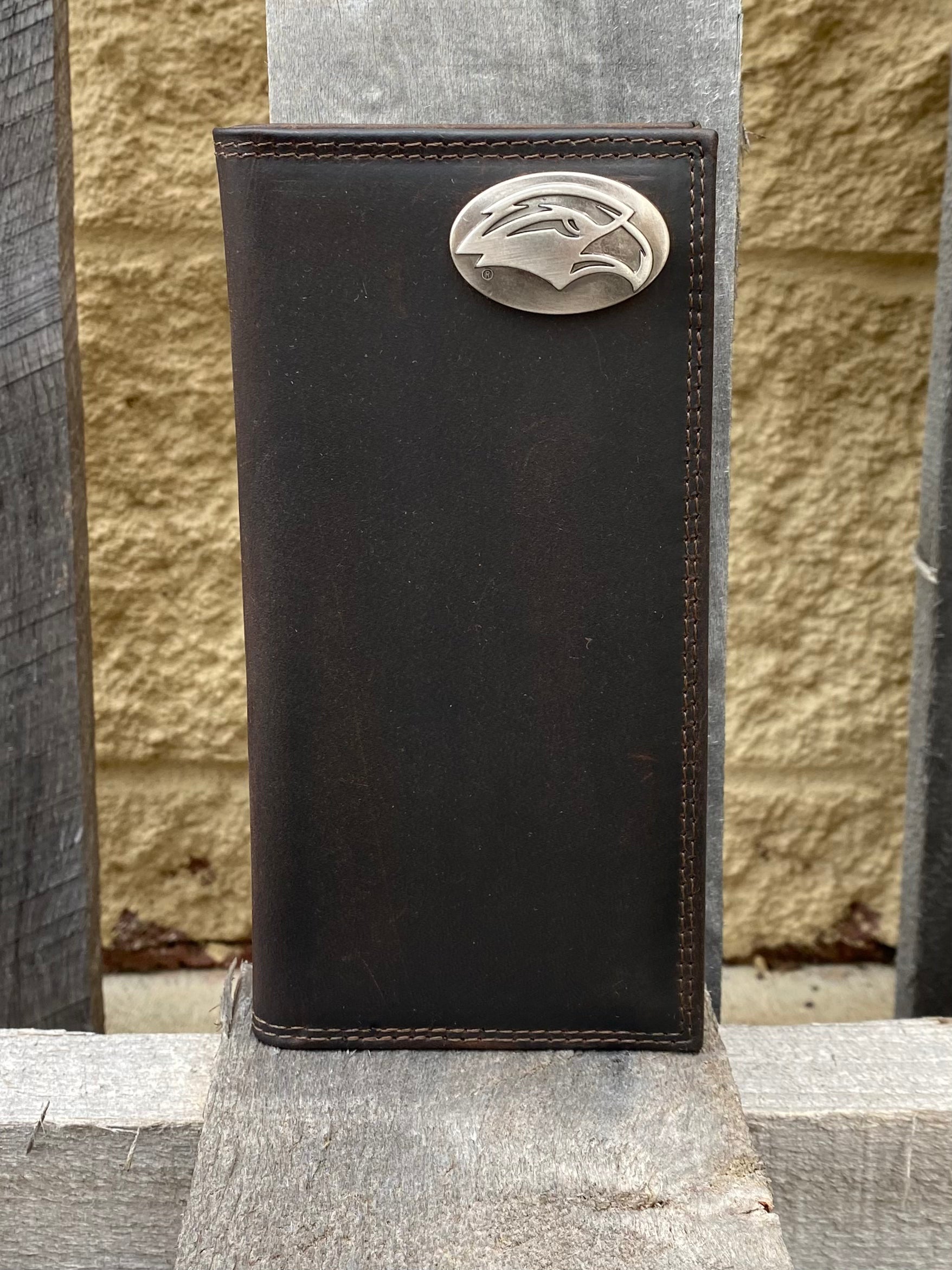 Zep-Pro University of Southern Miss Brown “Crazy Horse” Leather Tall Wallet with silver Golden Eagle Head logo oval concho on top right. Front view