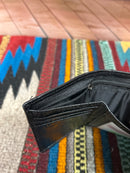 Black alligator print leather trifold wallet with a cowhide inset featuring a Rooster Concho. Interior view of cash slot showing zip closure. 