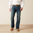 Men's Ariat M4 relaxed fit boot cut jeans in a medium wash. Front View