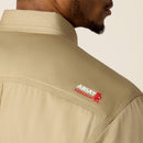 Men's Ariat FR long sleeve work shirt in Khaki. Close up of Ariat FR stitched on rear right shoulder. 